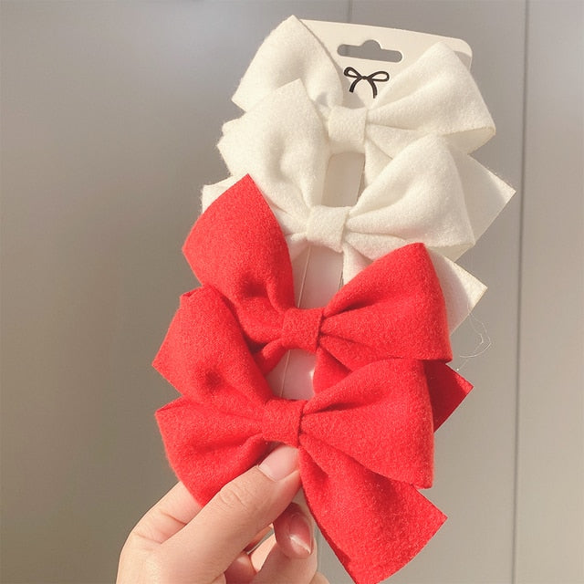 Gaby's Sweet Solid Colour Bow Clips